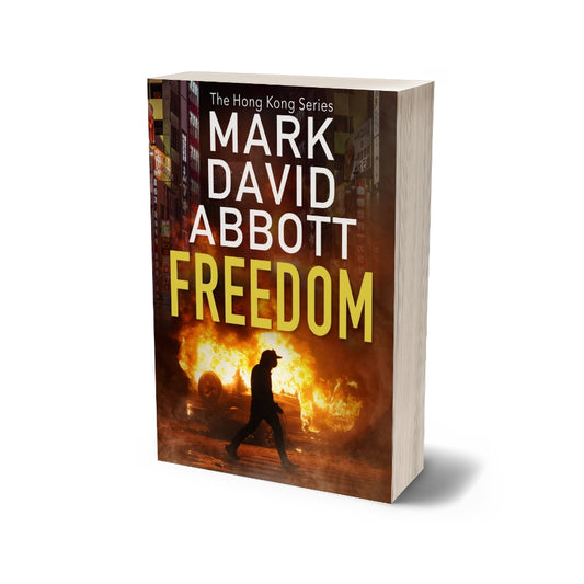 Paperback Book Cover of Freedom by Mark David Abbott – final installment in a political thriller series set in Hong Kong