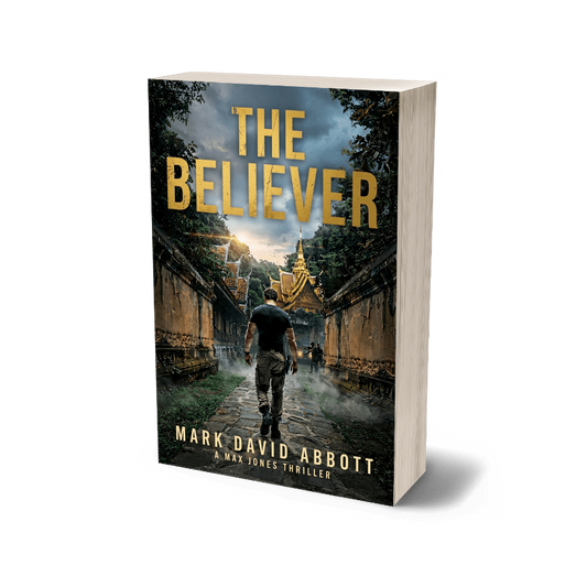 Paperback mockup of The Believer by Mark David Abbott, Max Jones Thriller Series Book 5, featuring a lone man walking toward a Thai temple.